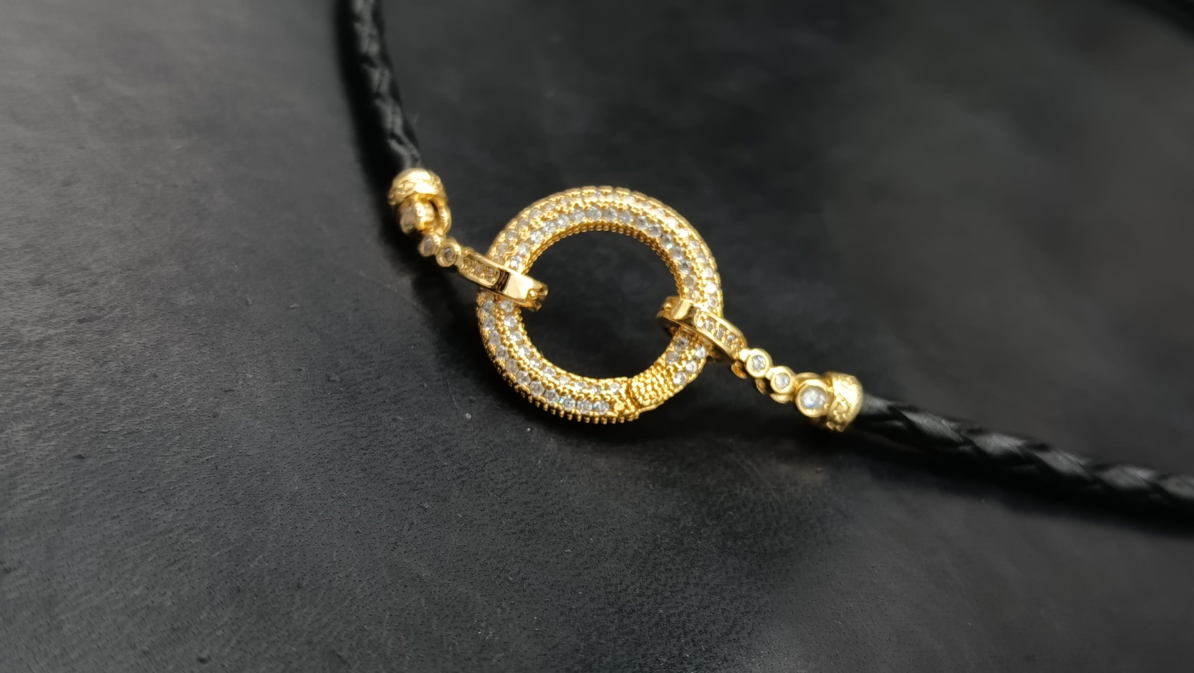 AURELIA oro • enlace ORBIT• Cierre MULTIPOSICIÓN •en Cuero trenzado